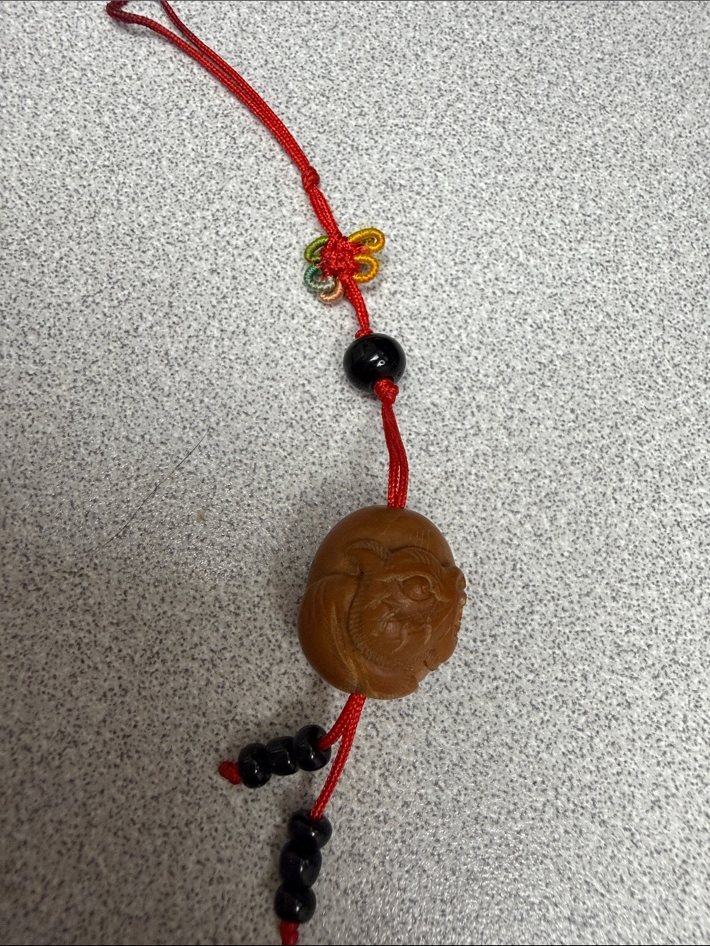 Hand Carved Brown Buddha Pendant Necklace with Red Cord